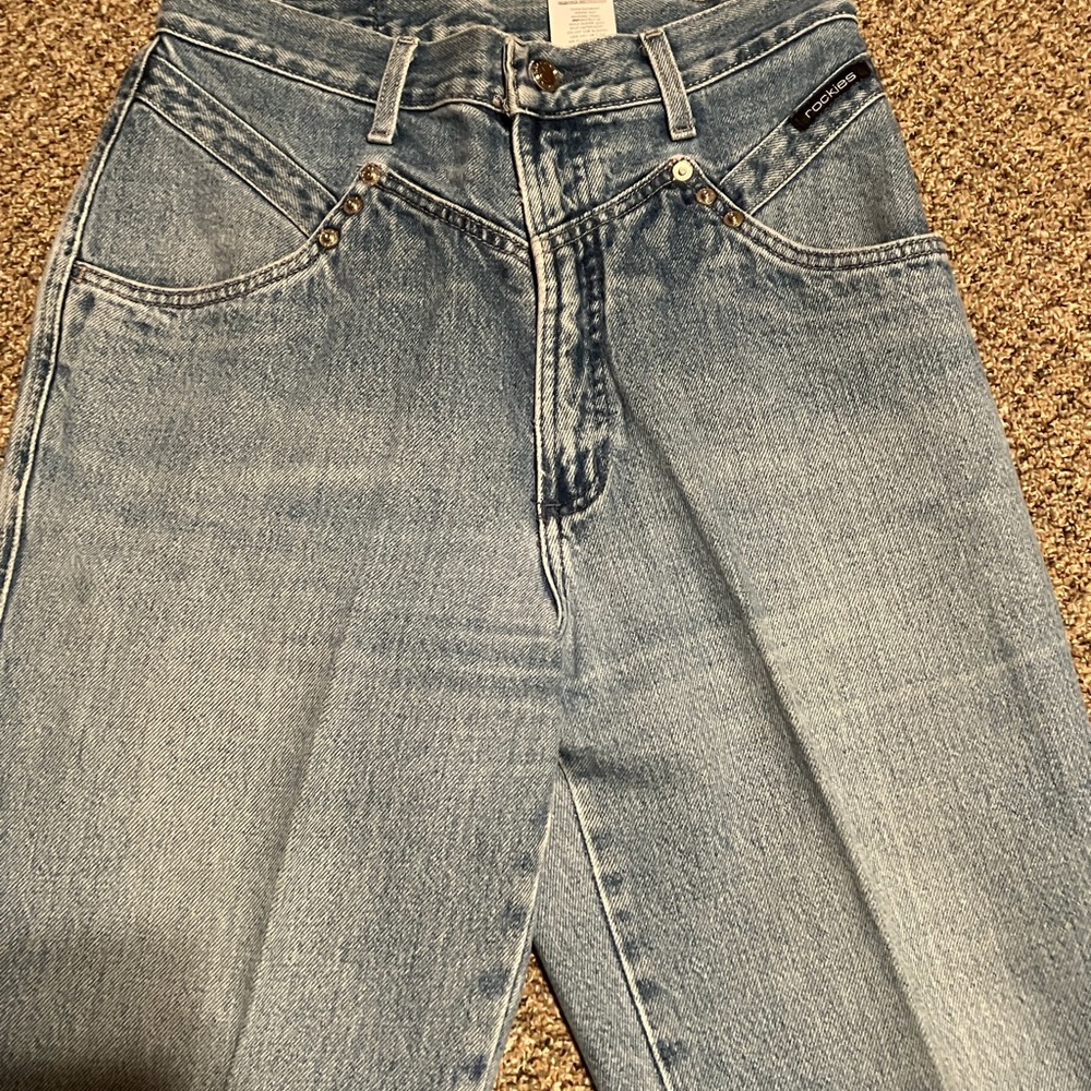 Light wash denim Rockies jeans.